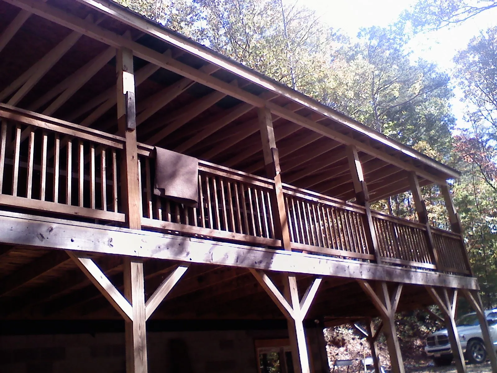Timber framing under a new elevated porch and deck — Roof Leak Repair in Lumber Bridge by Roofing Brothers